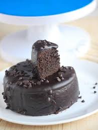 How To Make Chocolate Cake Recipe In Pressure Cooker Eggless Chocolate Cake Chocolate Cake Recipe Homemade Cake Recipes Cake Recipes
