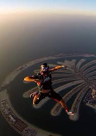 You'll have to book well in advance to secure a spot, but it's worth it as you dive through the clouds from 13,000 feet and take in views of the landmark palm jumeirah or rolling dunes of the desert. File Dobromir Slavchev Skydive Dubai Jpg Wikimedia Commons