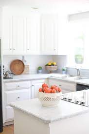 Moving on, here are the supplies you'll need if you want to tackle a counter top makeover of your own: How I Painted My Kitchen Countertops Andie Mitchell