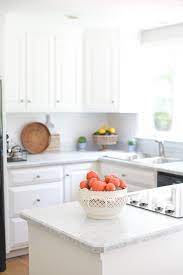 If it currently has a matte finish as opposed to a polished look, try a color enhancer sealer. How I Painted My Kitchen Countertops Andie Mitchell