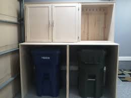 Garage Storage Garbage Can Bin With Storage Cabinet And Coat Rack Above Utilize That Garage Space Garbage Can Storage Garbage Can Can Storage