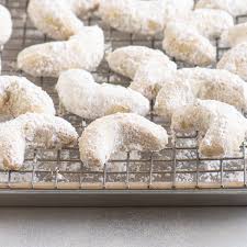 In the trees the branches are budding and small bird. Almond Crescent Cookies The Itsy Bitsy Kitchen