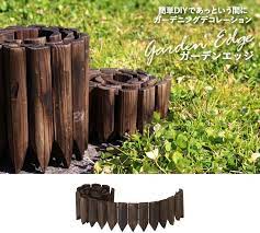 楽天市場 タカショー 花壇フェンス 連杭 エッジ ガーデニング 花壇 フェンス 柵 庭 仕切り ウッドフェンス 木製フェンス ガーデンエッジ焼磨 小 10 100cm 約 幅1000mm 奥行13 5mm 高さ100mm 花壇に合わせて形を変えられます くらしのもり 柵 庭 収納