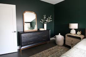 Dark Green Guest Room With Boho Style The Diy Playbook Green Bedroom Walls Green Master Bedroom Dark Green Rooms