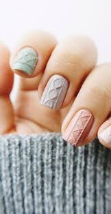 Red poinsettia nail art for winter holidays. 5 Fun Winter Nail Art Designs That Look Cute And Cozy Glam Radar