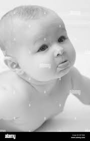 Six months old baby Black and White Stock Photos & Images