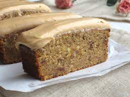 This Caramel Cake Is A Soft Fluffy Caramel Sponge Baked In A Loaf Tin Studded With Dates And Topped With A Smooth Rich Carame Caramel Recipes Desserts Baking