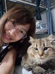 She's not the prettiest cat but she fell hard