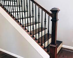 Metal stairs or a steel staircase ? Choosing Wood Or Wrought Iron Balusters For Your Home