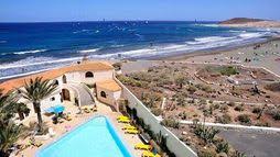 It is an ideal choice for a relaxing holiday with stunning views of the ocean and a fantastic array of amenities including an outdoor swimming pool, entertainment area, bars and a superb modern spa at a fee. Kn Arenas Del Mar Hotel In El Medano Tenerife Broadway Travel