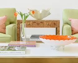 Living Room Interior Design By Blue Print Interiors With Burl Wood Side Table And Green Square Arm Club Chairs Blu Side Table Wood Print Store Orange Pillows