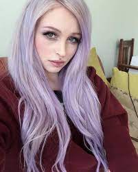 Bright colors stand out beautifully against silver hair colors, so adding them in a subtle way can create interesting moments, like this undercurrent of lilac hair dye coming from the roots. Welcome To Mordor Pastel Lilac Hair Lilac Hair Cool Hair Color