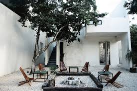 It has a rugged, cast stone base with a charming decorative center ring. 16tulum The Perfect Hideaway
