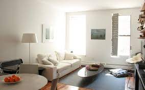 At home in the modern living room, this coffee table is the perfect complement to most long sofas and spacious rooms. Eames Elliptical Table And Walnut Stool Sculptural Design Icons