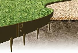 Adding the texture of corten steel to a garden with edging really brings the space together. Home Everedge