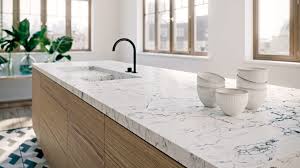 The furniture is painted in red and is covered by the wooden board. Essential Elements Of A Classic Kitchen Design Caesarstone Canada