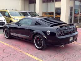 Black 2007 Ford Steeda Mustang Gt With Silver Horse Racing Rear Quarter Window Louvers Mrt Rear Louvers Axis Sport Wheels Mustang Mustang Gt Ford Mustang Gt