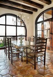 Spanish Style Dining Room With Exposed Beams And Terracotta Tile Modern Spanish Decor Spanish Style Homes Mediterranean Home Decor