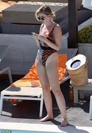 But claiming her adopted children are shields against racism is truly abhorrent. Love Island S Amy Hart Displays Her Incredible Figure In Animal Print Swimsuit 247 News Around The World