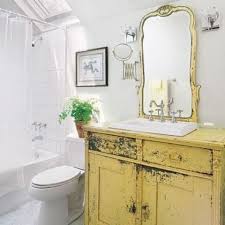 Shabby chic bathroom ideas don't come much better than a reclaimed, pastel painted roll top bath with claw feet and this one looks spectacular. 29 Vintage And Shabby Chic Vanities For Your Bathroom Digsdigs