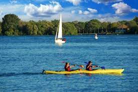Gauteng Kayaking A Kayak Is A Long Narrow Boat That Is Pointed At Both Ends A Traditional Kayak Has A Covered Deck A Kayaking Adventure Gifts Standup Paddle Board