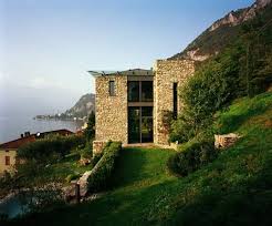 Feld72, architects photo all rooms enjoy a panoramic view over the lake below. Natural Italian Stone House Home Design Ideas Decorating House Design Inn Stone House Italian Architecture Architecture House