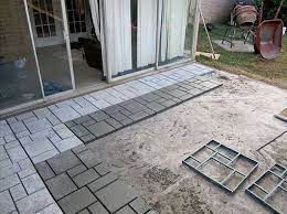 Some of the most popular concrete floor covering ideas are staining, polishing, stampable overlays and decorative epoxies. 9 Diy Cool Creative Patio Flooring Ideas The Garden Glove Patio Flooring Outdoor Patio Flooring Ideas Patio Stones