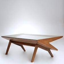 Plays well in danish modern and mid century modern spaces. Magazine Coffee Table By John Keal At 1stdibs