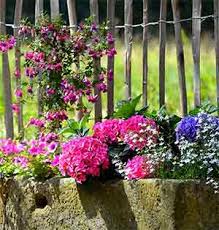 What flowers attract butterflies and % hummingbirds? How To Attract Birds And Butterflies Using Garden Planters