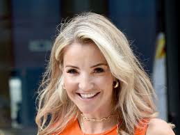 Helen Skelton shimmers at BRITs in waist-cinching silver dress of dreams