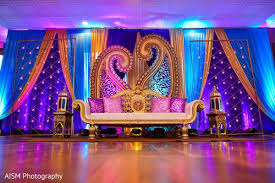 I Like The Draping Candle Walls And Giant Mangos Indian Wedding Decorations Receptions Indian Wedding Decorations Indian Reception