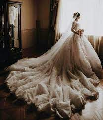 Huge And Wavy Wedding Gown Trains Like This Are The Most Photogenic And Dramatic Whether It Be Colore Fluffy Wedding Dress Wedding Dresses Pink Wedding Dresses