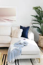 Black And White Mid Century Modern Rug Ivory Off White Mid Century Modern Sofa I Love The Black And White Striped Kilim Rug Layered Over The Interior Define Sofa Home Decor Living Room Furniture