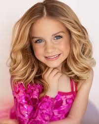 These two BEAUTIFUL babies BOTH took home a Photogenic win AND Miss and  Little Miss Fourth District titles this past Friday at their school pageant  and I could not have been more