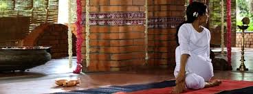 Sitting Half Spinal Twist Art Of Living Yoga Benefits Yoga Art Of Living