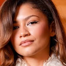 TikTokers With Locs Are Trying the '70s Hair Flip Trend — Watch Videos