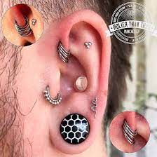 Something A Little Different Check Out This 3 Week Healed Forward Helix Coinslot Done For Our Own M Front Helix Piercing Helix Piercing Multiple Ear Piercings