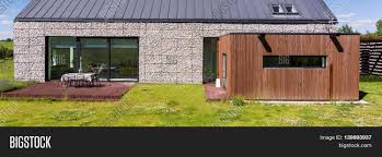 Beautiful mountain landscape with house. Example Modern Stone Image Photo Free Trial Bigstock