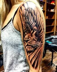 Black And Grey Tattoo Artists Austin The Start To My Sleeve My Lion And His Feathers First Session Done Grey Tattoo Tattoo Artists Black And Grey Tattoos
