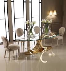Combining a curved trumpet base and fluted stem with a sleek round top this stylish dining option will make for a seamless addition to any interior. Designer 24 Carat Gold Oval Glass Dining Set Glass Dining Room Table Glass Dining Table Glass Dining Set