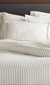 Linen duvet cover striped in white and natural linen (oatmeal) color. Pure Linen Wide Stripe Warm White Duvet Covers And Pillow Shams Crate And Barrel Bedding Master Bedroom Bed Linens Luxury White Duvet