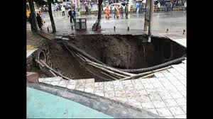 massive sinkhole swallows up four
