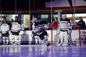 Huskies Sign Luke and Will as Part of Team Impact