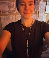 I have made many an attempt over the years at making rose beads from my  roses, and then many attempts at making a rosary with them. This past  summer I made some