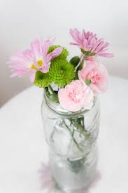 It makes a great centerpiece for a dining room table or mantle with the intricate details of the lace providing a nice focal point. 10 Minute Decorating 5 Mason Jar Flower Arrangements Perfect For Spring Making It In The Mountains