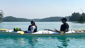 A kayak hatch in the stern means you'd have to turn around in your seat to access it while on the water. Double Kayaks Hello Nature Adventure Tours
