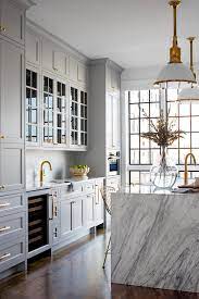 Use light shades for a bright and open look. 6 Proven Tips For Choosing The Perfect Gray Kitchen Cabinet Colors Grey Kitchen Designs Grey Kitchen Kitchen Marble