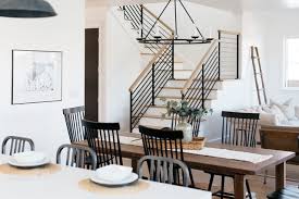 Living room featured in tricia guilds book in town. Black Metal Stair Rail In Modern Urban Farmhouse Magnolia Home Style Farmhouse Dining Room Los Angeles By Madison Modern Home Houzz