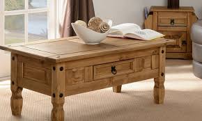 Its hand waxed finish enhances the wood grain and this together with the ornate handle and studs create a distressed rustic look. Corona Coffee Table With Drawer Groupon