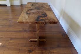 Contrasting with the dark reclaimed, hand hewn, wide plank wood floor and homestead. Burr Elm Waterfall Coffee Table Dama Designs